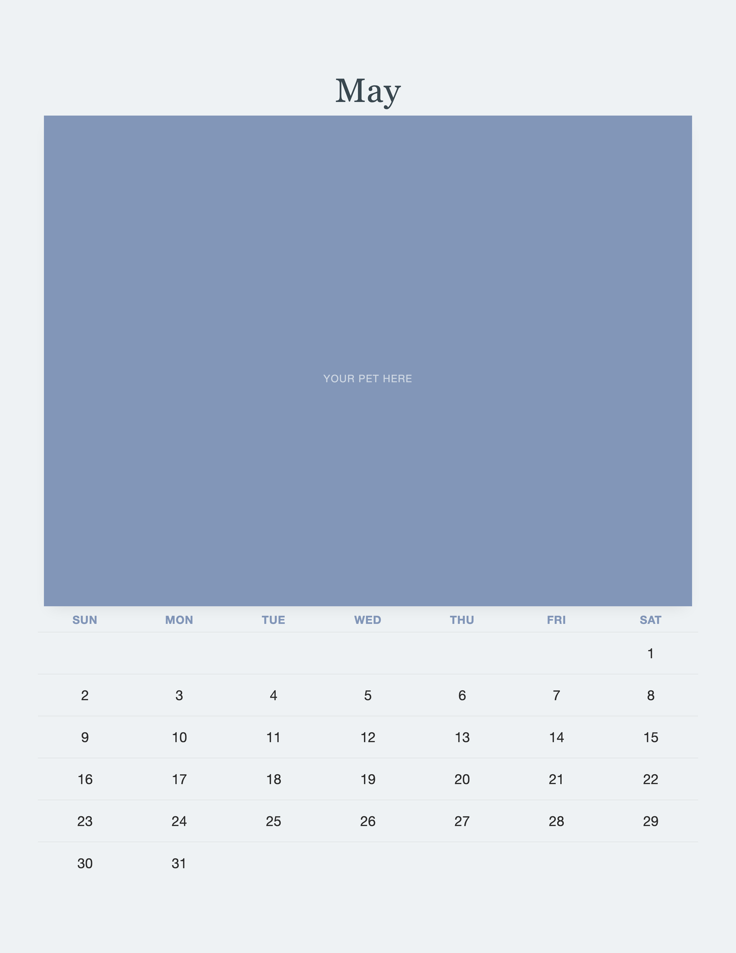 May page of the Pet Memorial Calendar 2027 — In Loving Memory, with a photo area above the date grid