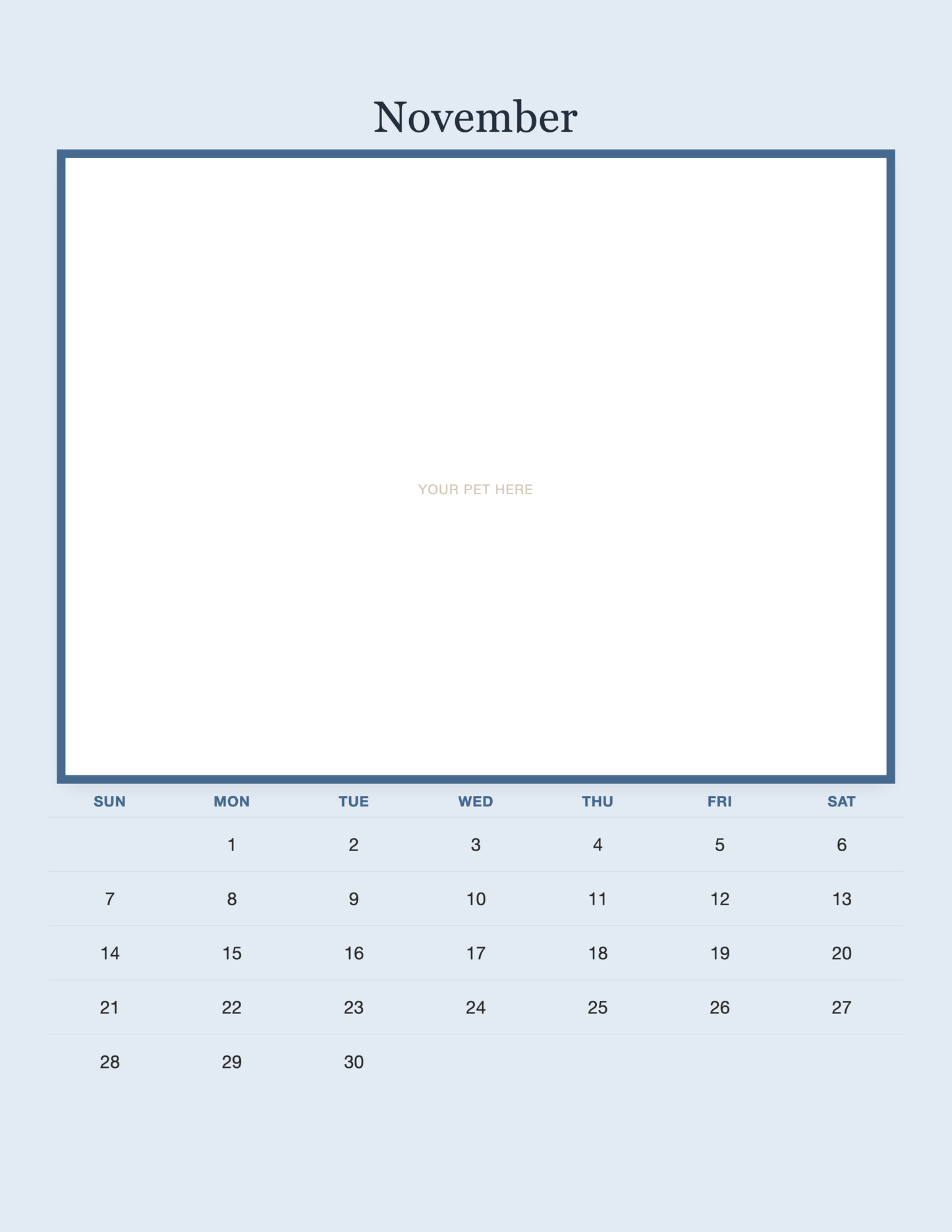November page of the Personalized Pet Photo Calendar 2027 — Minimalist Blue, with a photo area above the date grid